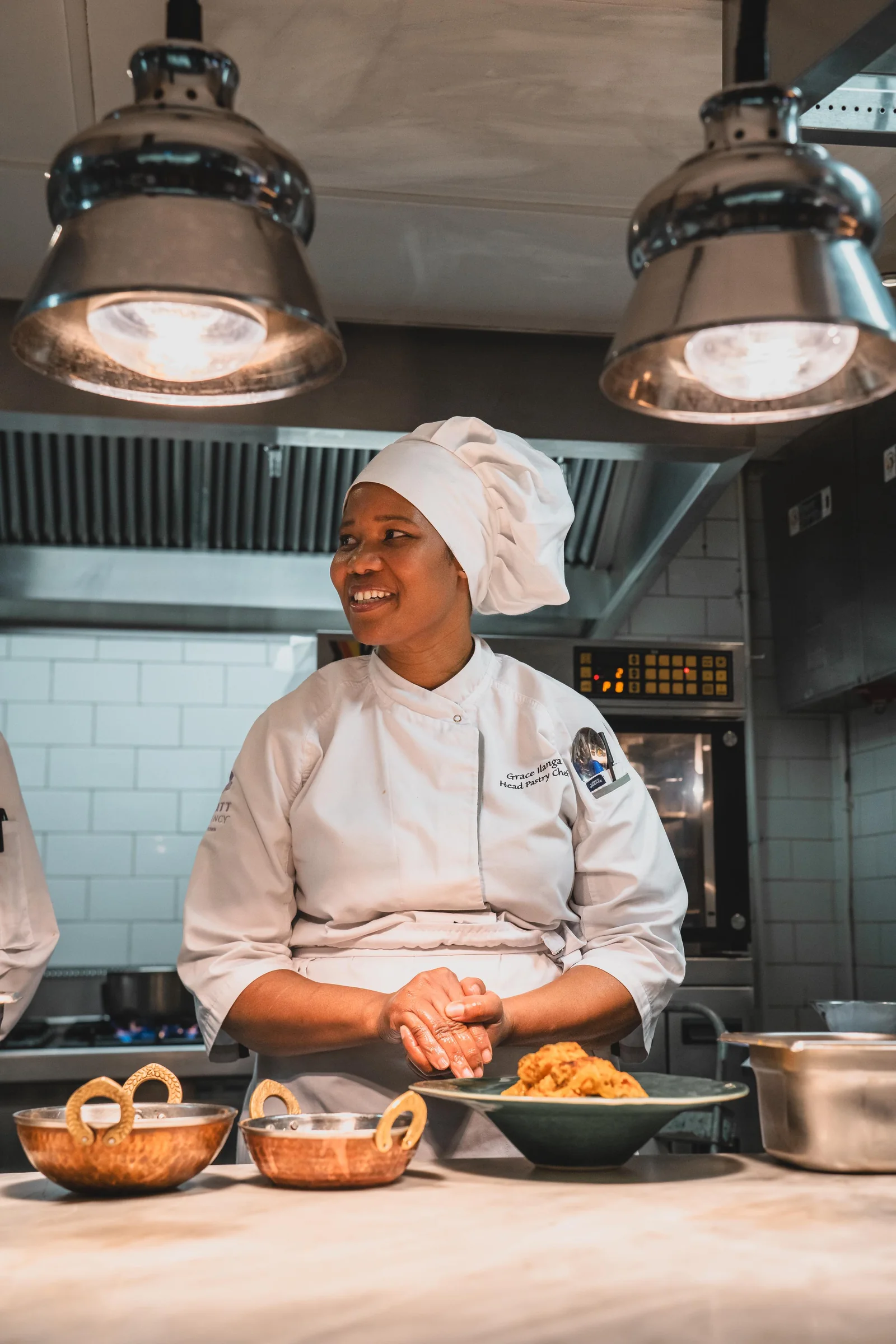 Grace Ilanga na cozinha durante a primeira edição de Cooking in South Africa
